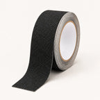 Black anti-slip tape mat by STAALFABRIQ, 5 meters long, designed as a stair safety accessory with textured surface for secure footing.
