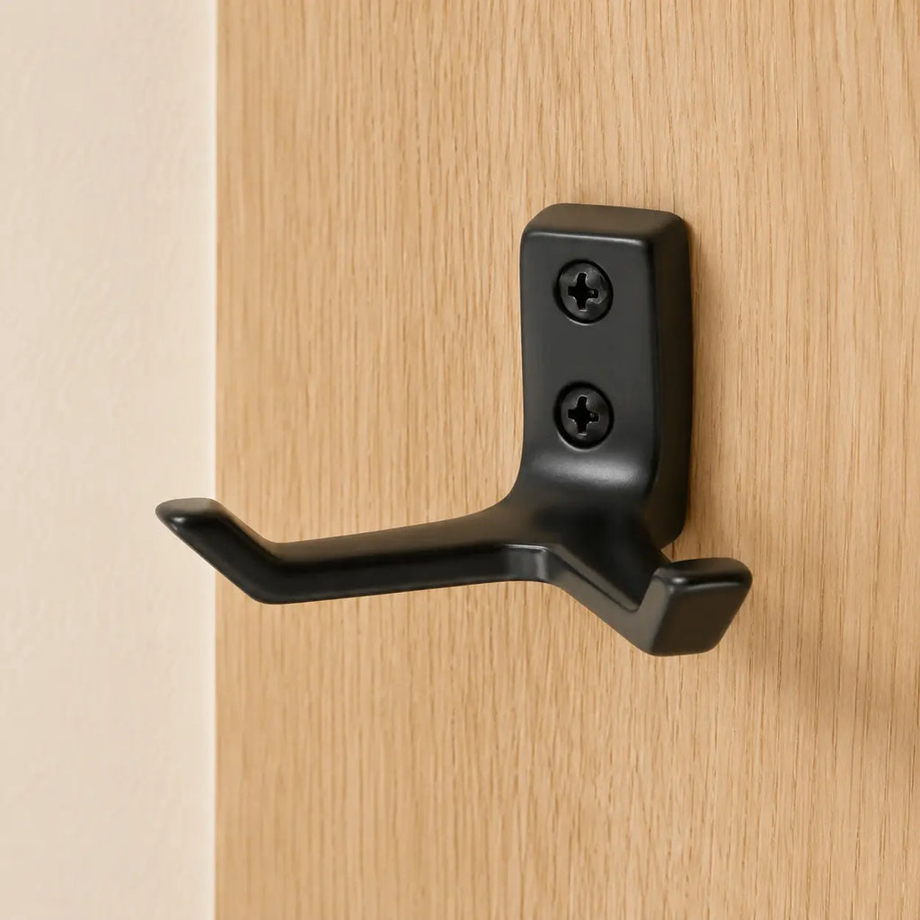 Double black wall hook from STAALFABRIQ, sturdy metal wall hook with two hanging points for organization.