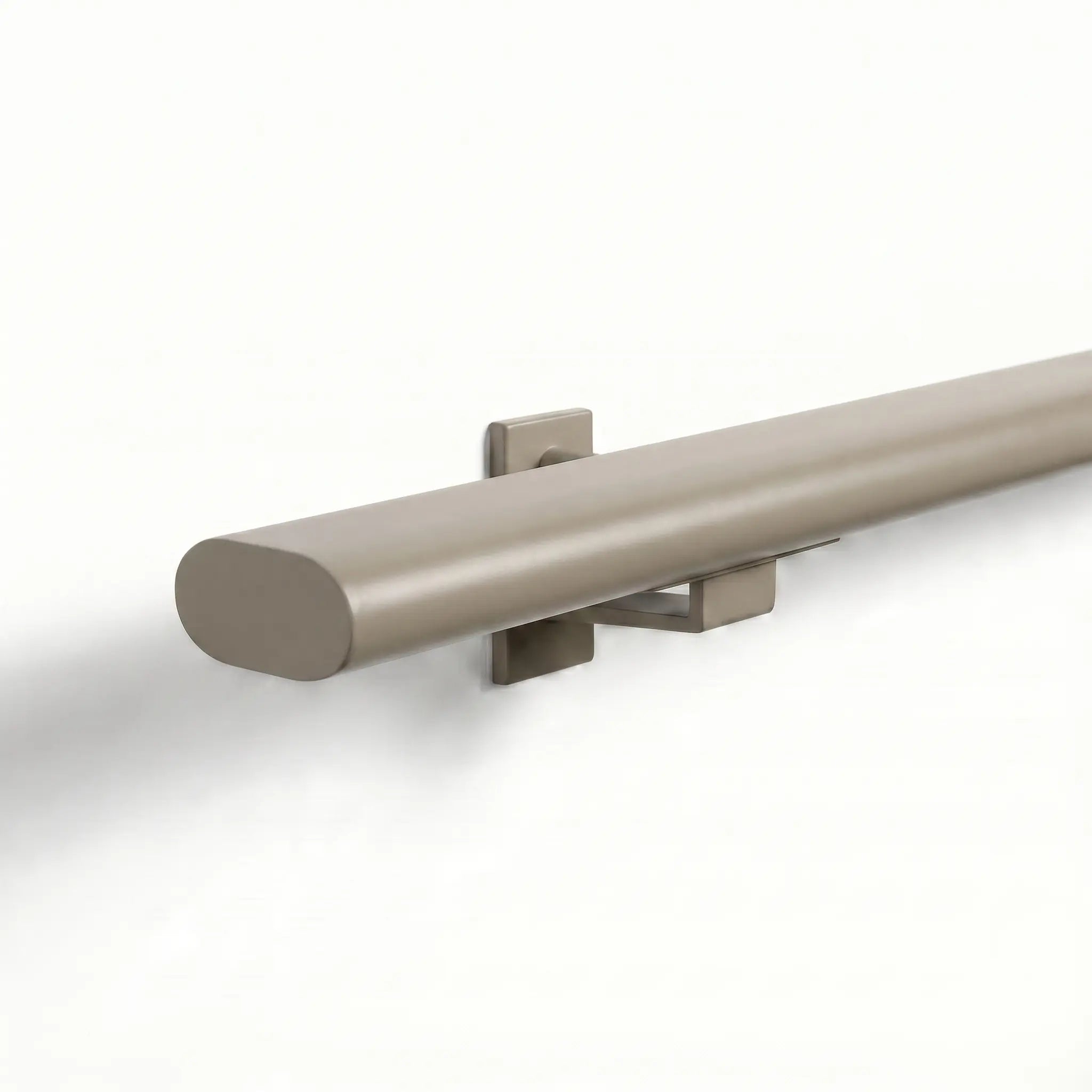 Ovaal-shaped greige stainless steel stair railing trapleuning with seamless finish, measuring 48x20mm, by STAALFABRIQ.
