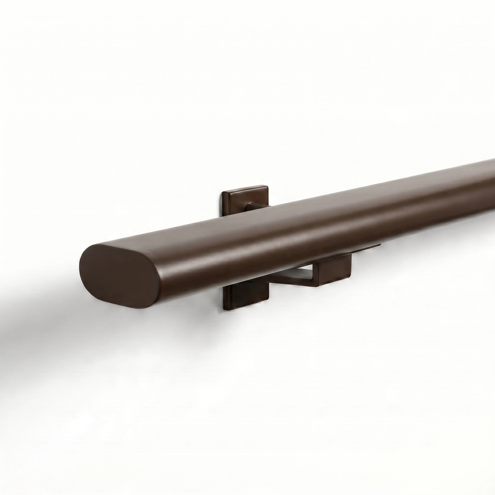 STAALFABRIQ Terra Brown oval seamless stair railing trapleuning with 48x20mm dimensions, showing the bronze-colored finish and smooth design.