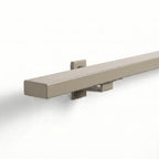 Stalen trapleuning in rechthoekig design, greige color, seamless 40x20mm profile by STAALFABRIQ, shown in image with RAL1019 finish.