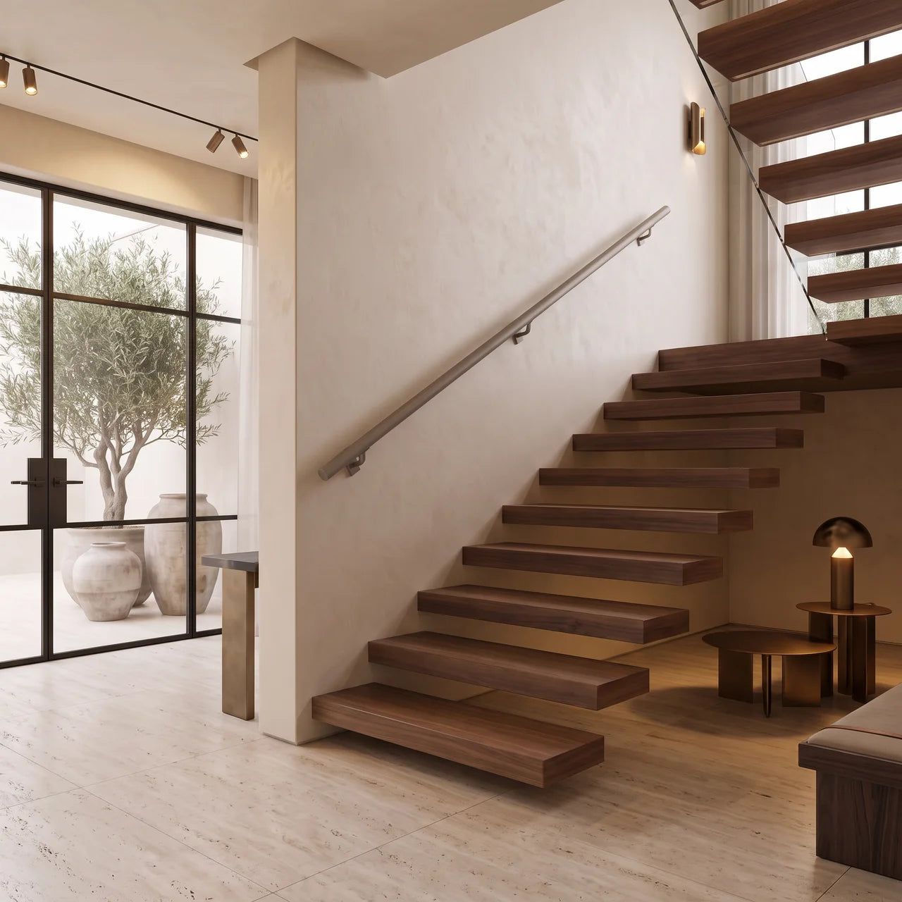 Round greige stainless steel handrail for stairs, seamless 30mm diameter, by STAALFABRIQ.