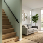 Black oval seamless steel handrail profile 48x20mm by STAALFABRIQ, showing a close-up of the polished, glossy surface.